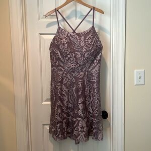 Lavender with sparkle lace detail.
Mini dress